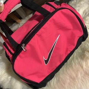 Nike pink small duffel bag